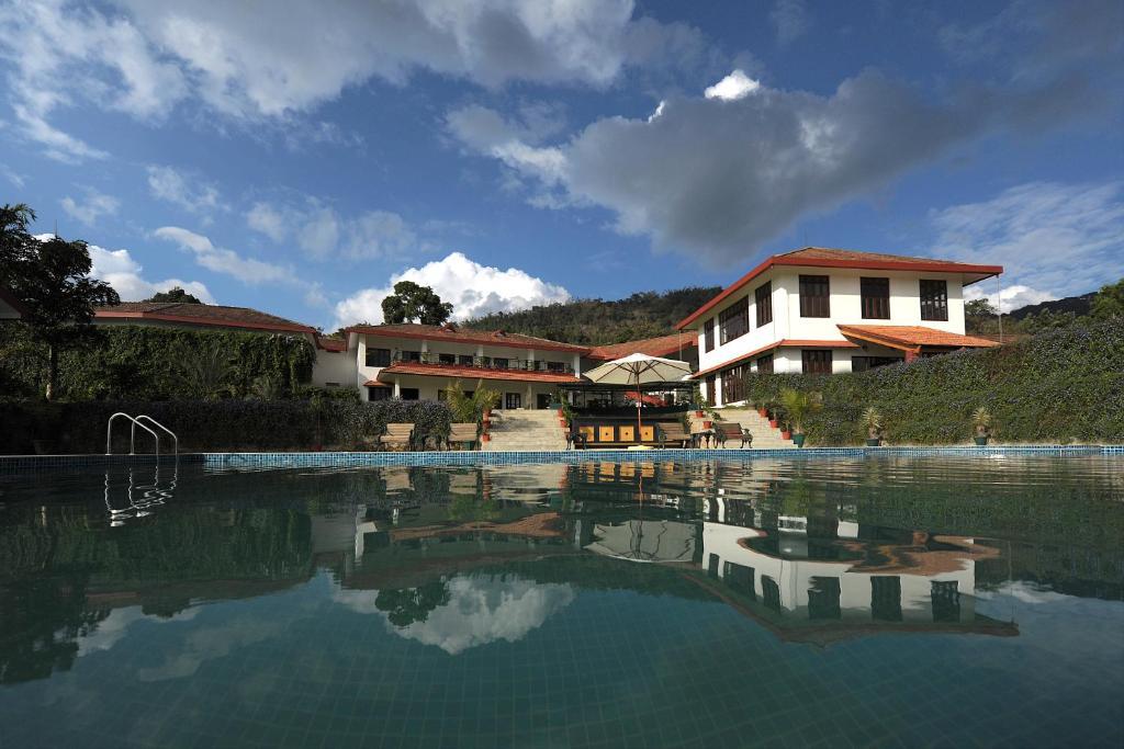 Amritara Ambatty Greens Resort Virajpet Bagian luar foto